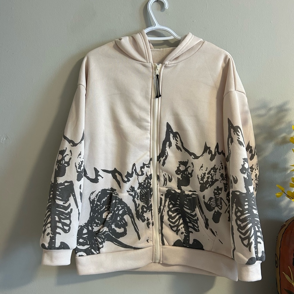 Cream Hoodie with Skeleton Print